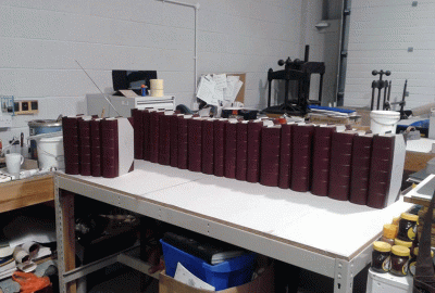 23 half bound leather books ready for siding